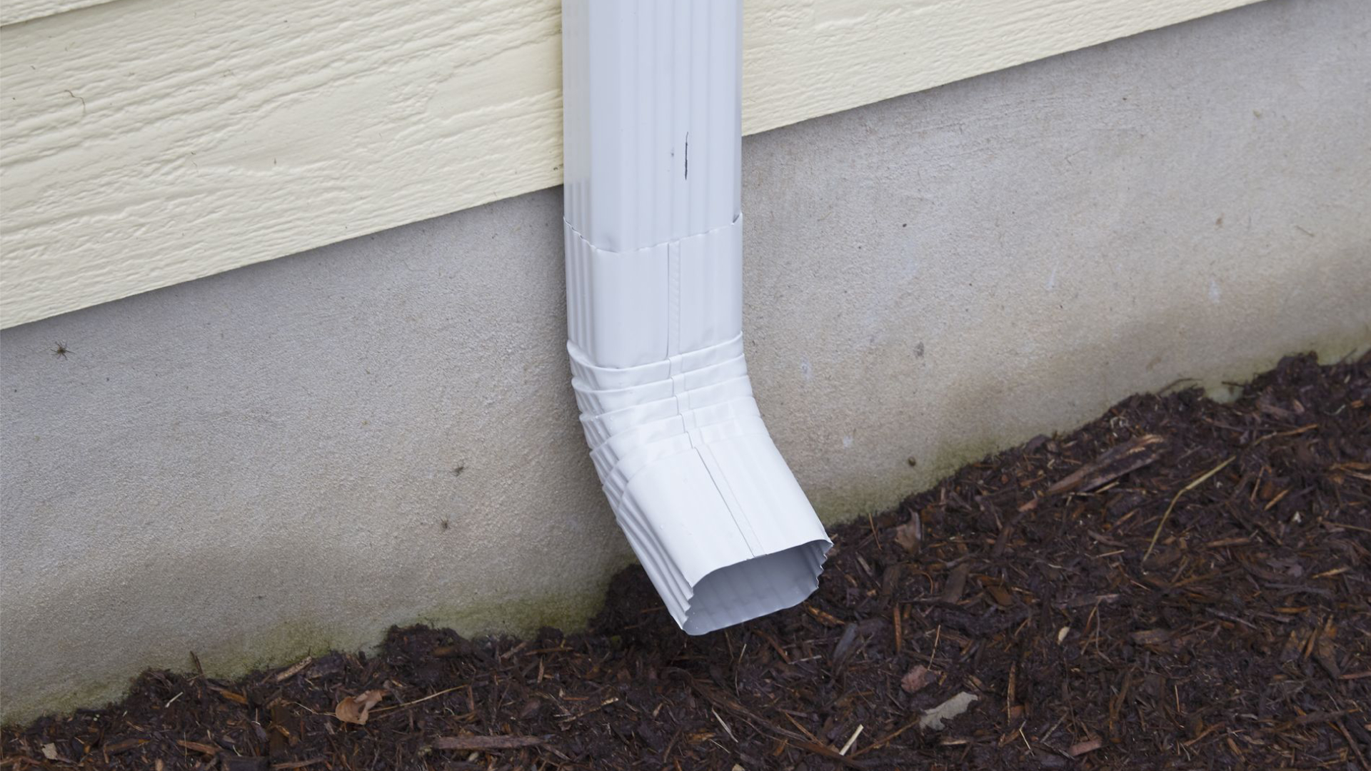 Downspout repair services to ensure proper water drainage